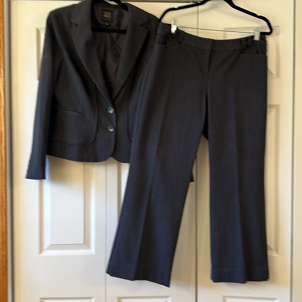 2 piece suit. Pants and jacket. Dark gray.